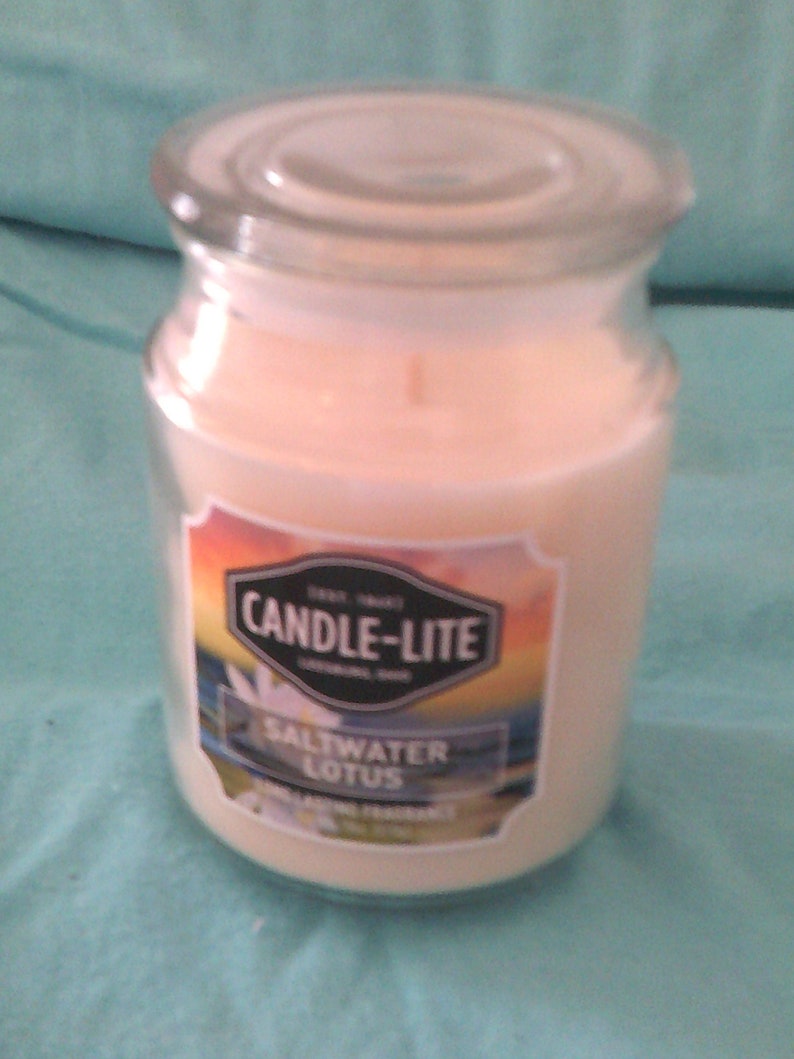 New SALTWATER LOTUS Candlelite Candle Glass Jar With Glass Lid 18 Oz