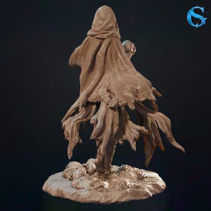 May include: A detailed sculpture of a robed figure with a hood, holding a small orb. The figure's cloak is tattered, and the base features skulls. The color is a muted brown, with a dark background.