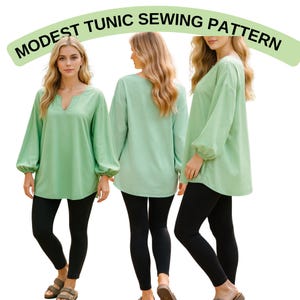 May include: Three women wearing mint green tunics with long sleeves and V-necks, teamed with black leggings. The tunics have a loose fit. The text "MODEST TUNIC SEWING PATTERN" is arched above the models.