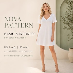 May include: A white mini dress with short sleeves and a V-neckline. Text reads: NOVA PATTERN BASIC MINI DRESS PDF SEWING PATTERN US 2-40 | XS-4XL A4 US LETTER A0 PROJECTOR CUSTOM FIT OPTION AVAILABLE NOW. The dress has a simple, straight silhouette.