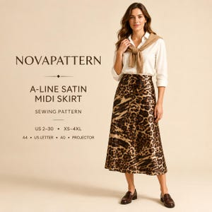 May include: A-line satin midi skirt sewing pattern by NOVAPATTERN. The skirt features a brown and black leopard print. Text includes NOVAPATTERN, A-LINE SATIN MIDI SKIRT, SEWING PATTERN, US 2-30, XS-4XL, A4, US LETTER, A0, and PROJECTOR.