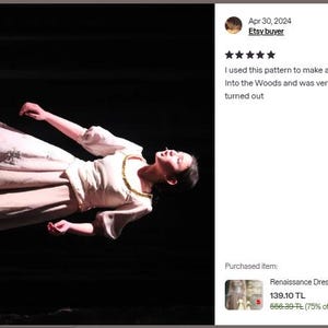 May include: A person wearing a cream-colored Renaissance dress with a gold necklace, lying down against a dark background. The dress has a long skirt and sleeves. The image includes a customer review about using the pattern to make a Cinderella costume.