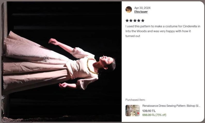 May include: A person wearing a cream-colored Renaissance dress with a gold necklace, lying down against a dark background. The dress has a long skirt and sleeves. The image includes a customer review about using the pattern to make a Cinderella costume.
