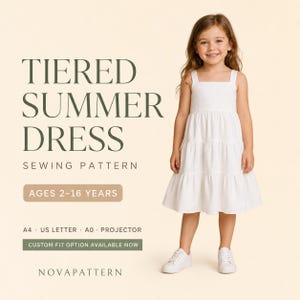 May include: A white tiered summer dress sewing pattern for ages 2-16 years. The text reads TIERED SUMMER DRESS SEWING PATTERN, AGES 2-16 YEARS, A4, US LETTER, A0, PROJECTOR, CUSTOM FIT OPTION AVAILABLE NOW, and NOVAPATTERN. The dress has thick straps.