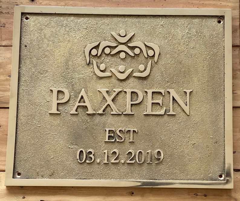 Personalized last name brass signs & plaques - Customized plaques - Coat of arms wall plaques - Cast brass embossed plaques
