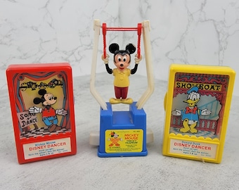 Vintage Disney toys (set of three) | Vintage Mickey Mouse Dancer, Donald Duck Dancer, and Mickey Mouse Tricky Trapeze toys