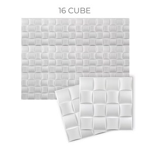 May include: White 16 Cube acoustic wall panels. The panels are arranged in a grid pattern and have a slightly raised, textured surface.