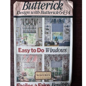 May include: A vintage Butterick sewing pattern for home decorating, with the text "Easy to Do Windows" and "Faciles à Faire Fenêtres." The cover shows window treatment designs with floral and striped patterns. The pattern is from Waverly.