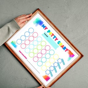 May include: A colorful printable potty training chart with a rainbow watercolor background. The chart has 30 circles to color in, a space for a name, and a reward section. It also includes the text "My Potty Chart" and "You did it!" stickers.