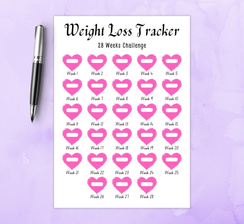 May include: A printable weight loss tracker with 28 pink heart-shaped boxes for each week of a 28-week challenge. The text "Weight Loss Tracker" and "28 Weeks Challenge" is printed at the top of the page.
