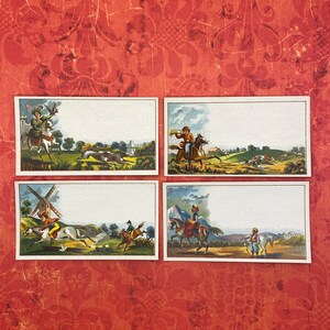 May include: Four vintage cards with illustrations of people riding horses. The cards are white with a light blue border and feature a variety of scenes, including a windmill, a castle, and a forest.