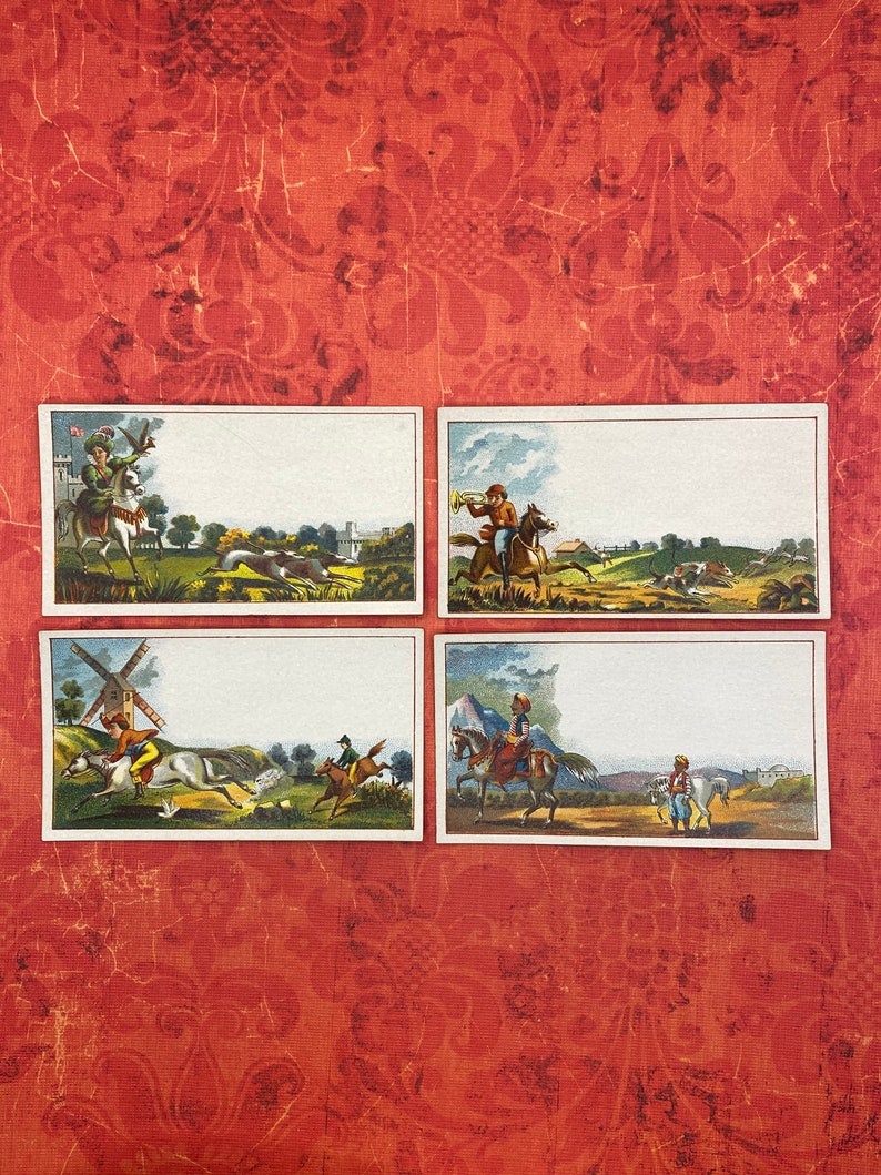 May include: Four vintage cards with illustrations of people riding horses. The cards are white with a light blue border and feature a variety of scenes, including a windmill, a castle, and a forest.