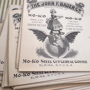 May include: A stack of vintage Mo-Ko Steel Cut Cereal Coffee advertisements. The black and white advertisements feature a woman standing on a globe with wings, and the text "Made Like Coffee Tastes Better."