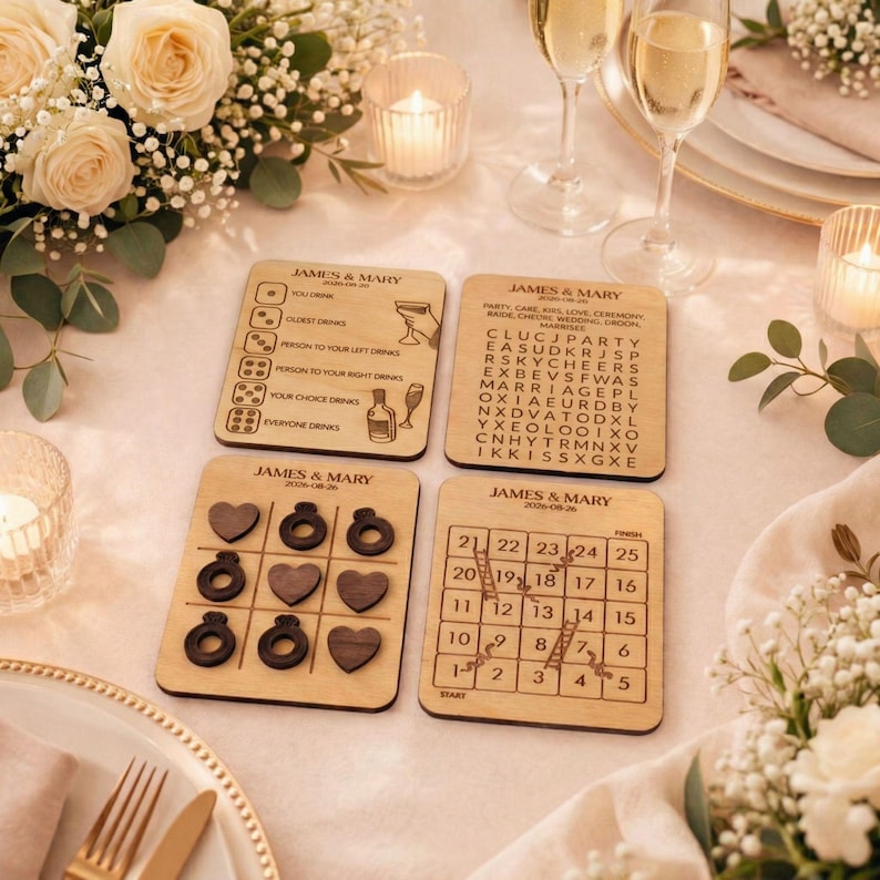 a table setting with four wooden coasters and a tic-tac-toe board, all adorned with elegant floral arrangements and candles.