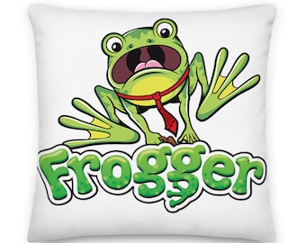 Könnte beinhalten: Ein grüner Comic-Frosch mit einer roten Krawatte und dem Wort "Frogger" in grünen Buchstaben darunter.