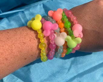 Pulseras de cuentas de ratón que brillan en la oscuridad