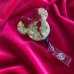 Carrete de insignia de ratón Rose Bow Encantado
