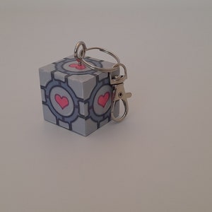 I made the companion cube from portal in my ceramics class : r/gaming