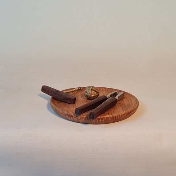 Christmas plate with teak corkscrew and nutcracker
