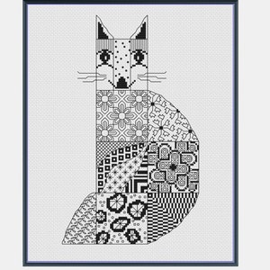 May include: Black and white cross-stitch art of a fox in a dark blue frame. The fox is composed of geometric patterns, including floral and abstract designs. The artwork is displayed on a white background.