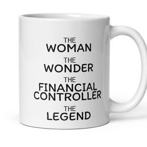 May include: White ceramic mug with black text that reads "The Woman, The Wonder, The Financial Controller, The Legend".