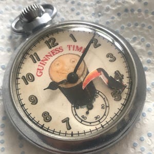 Orologio Da Tasca Guinness Ravel – Quadrante Bianco Con Numeri Arabi, Catenina Inclusa, Movimento Quarzo