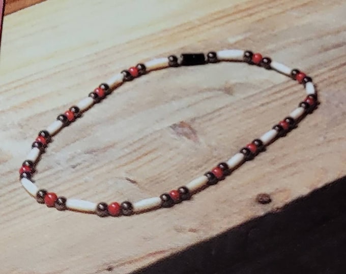 18 inch Magnetic hematite, red coral and real bone.