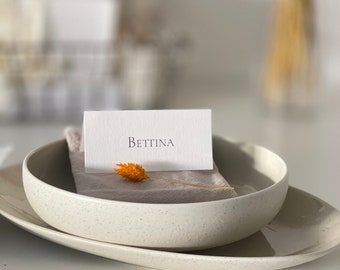 Special place cards, name tags, place cards on handmade paper, seating arrangements