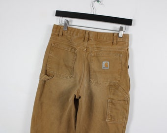 Pantalones de carpintero / Vintage Carhartt Construction Workwear Studio Cargo Utility Pantalones / Jeans streetwear de los años 90