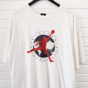 Air-Jordan Flight-Club T-Shirt | Vintage Basketball Graphic Tee | Retro Sportswear Collectible
