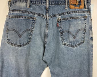 Levi's 550 relaxte jeans | Vintage denim broek met lichte wassing | Klassieke jaren 90 rechte pijpen | Afmeting: 36 x 32 inch