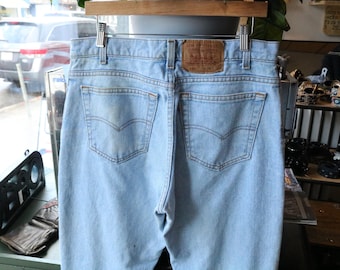 Pantalones vaqueros Levi's 550 / Vaqueros de mezclilla de lavado claro estilo vintage de los 90, pierna recta / Pantalones clásicos de cinco bolsillos para el día a día