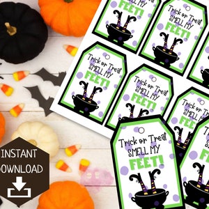 May include: Printable Halloween treat bag tags with a witch's legs sticking out of a cauldron. The tags are green and white with purple polka dots and the text "Trick or Treat Smell My Feet!"