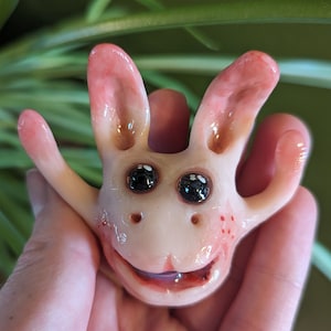 Small Cute Sculpture With Arms