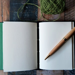 A6 Celtic handmade notebook with ivory cream, blank pages.