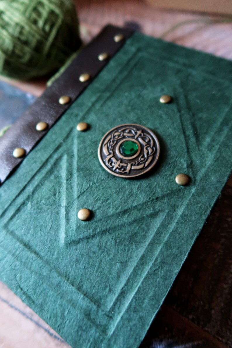 A6 Celtic handmade notebook with a green Lokta paper hard cover.