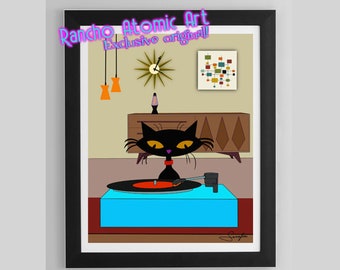 May include: A black cat with yellow eyes sits in front of a vintage record player in a mid-century modern living room. The cat is wearing a purple collar and is looking directly at the viewer. The record player is on a turquoise stand and has a red record on the turntable. The room is decorated with a brown and gold sideboard, a clock with a starburst design, and a geometric wall hanging. The text "Rancho Atomic Art Exclusive Original!" is in pink letters at the top of the image.
