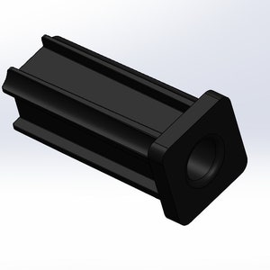 May include: Black plastic connector with a square end and a round hole in the center. The connector has a ribbed design on the sides.