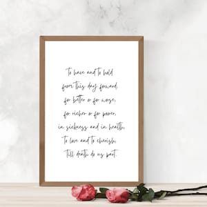 May include: A framed print with a white background and black text. The text reads "To have and to hold from this day forward, for better or for worse, for richer or for poorer, in sickness and in health, To love and to cherish, Till death do us part."