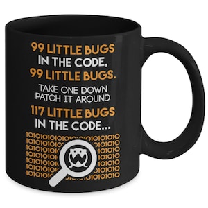 May include: A black ceramic mug featuring orange and white text that reads: 99 LITTLE BUGS IN THE CODE, 99 LITTLE BUGS. TAKE ONE DOWN PATCH IT AROUND 117 LITTLE BUGS IN THE CODE... Below the text is a pattern of binary digits and a magnifying glass icon.