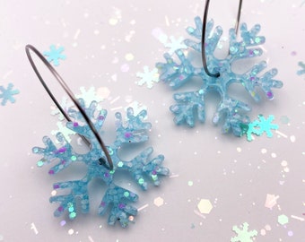 Handmade Snowflake Spinner Hoop Earrings, choice of blue or white glitter, Christmas and holiday jewelry, winter outfit accessory
