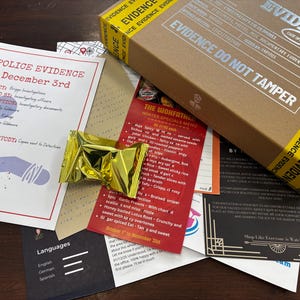 May include: A selection of items suggesting a police investigation, featuring a box marked "EVIDENCE" with yellow tape, various documents, a menu, and a gold foil-wrapped item. The documents contain text.