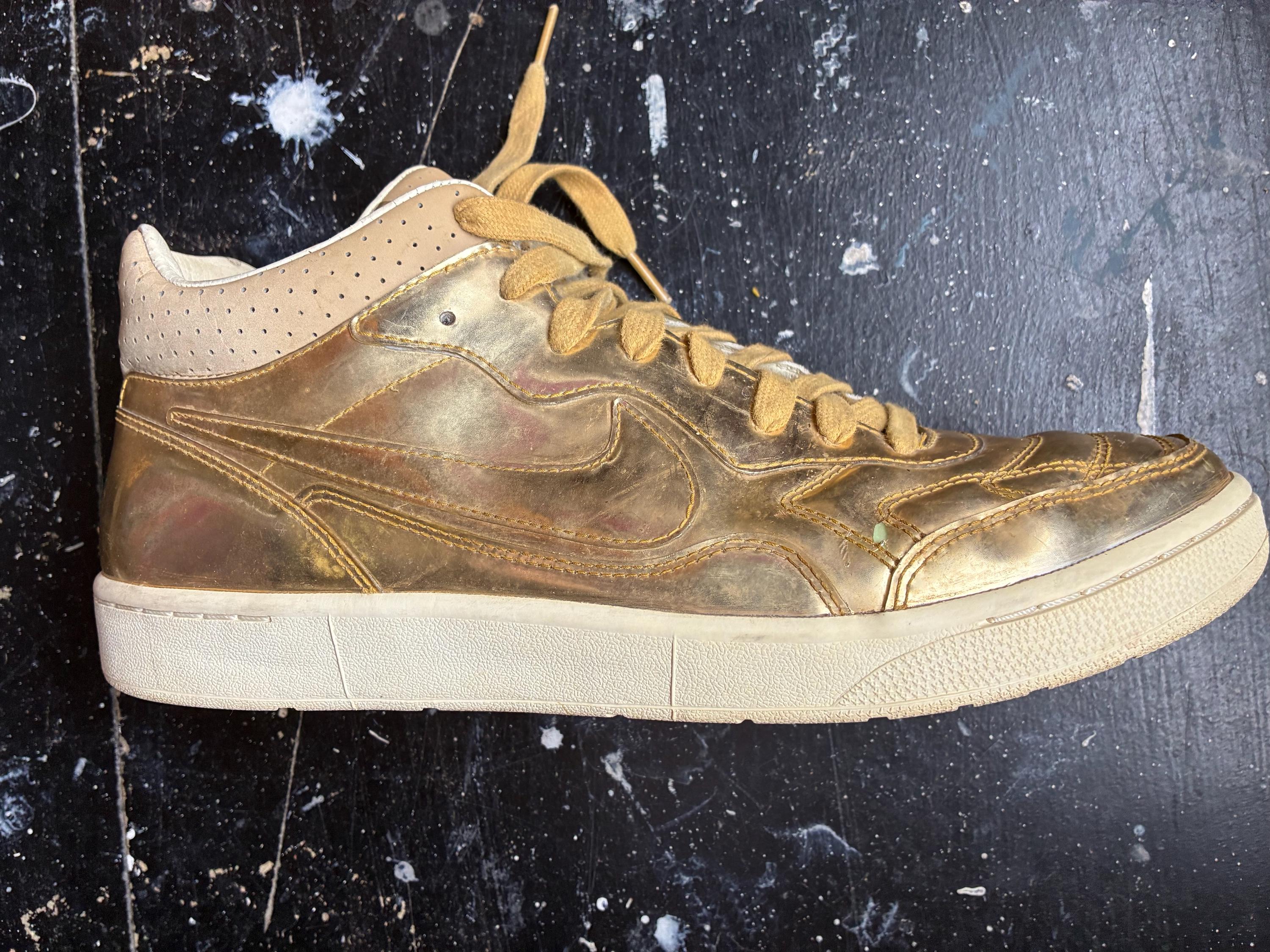 gold high top nikes