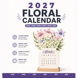 Può includere: Un set di file digitali per un calendario floreale 2027 che include i formati SVG, PNG, EPS, PDF, JPG e DXF. Il design presenta una composizione floreale 3D a strati sopra una pagina del calendario di marzo, su una base in legno.