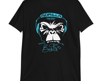 May include: Black t-shirt with a blue graphic of a gorilla wearing headphones. The text "Gorilla Stay Wild Beats" is printed on the shirt.