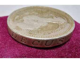 希少な 1983 年 1 ポンド硬貨 – エリザベス 2 世 – エッジの刻印エラー