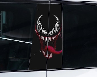 May include: A black car with a Venom graphic on the back windows. The graphic is a black and white illustration of Venom's face with the word "Venom" written in white letters.
