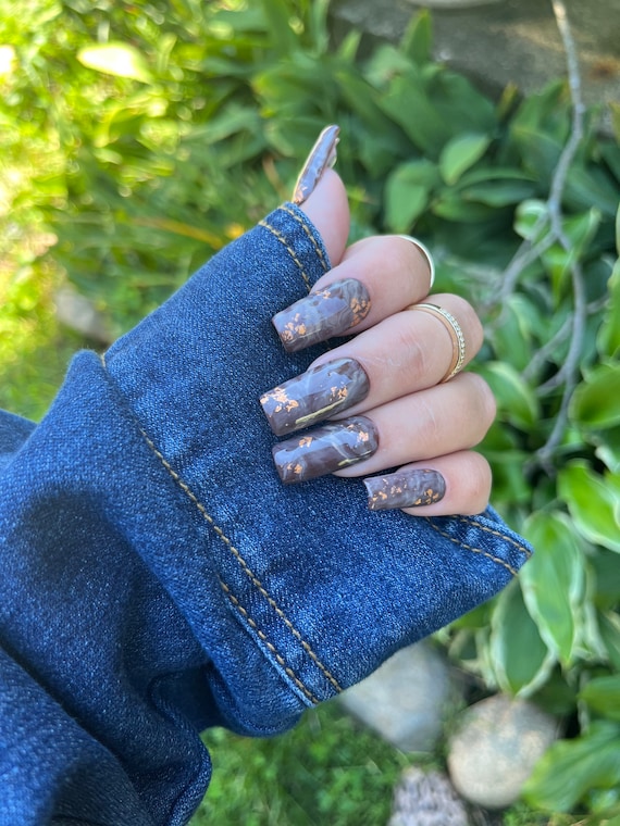 Gold foil marble nails