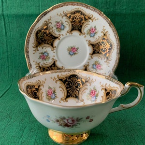 Vintage 1960s Paragon Fine Bone China Footed Cup & Saucer IC/G In Black And Gold With Flowers