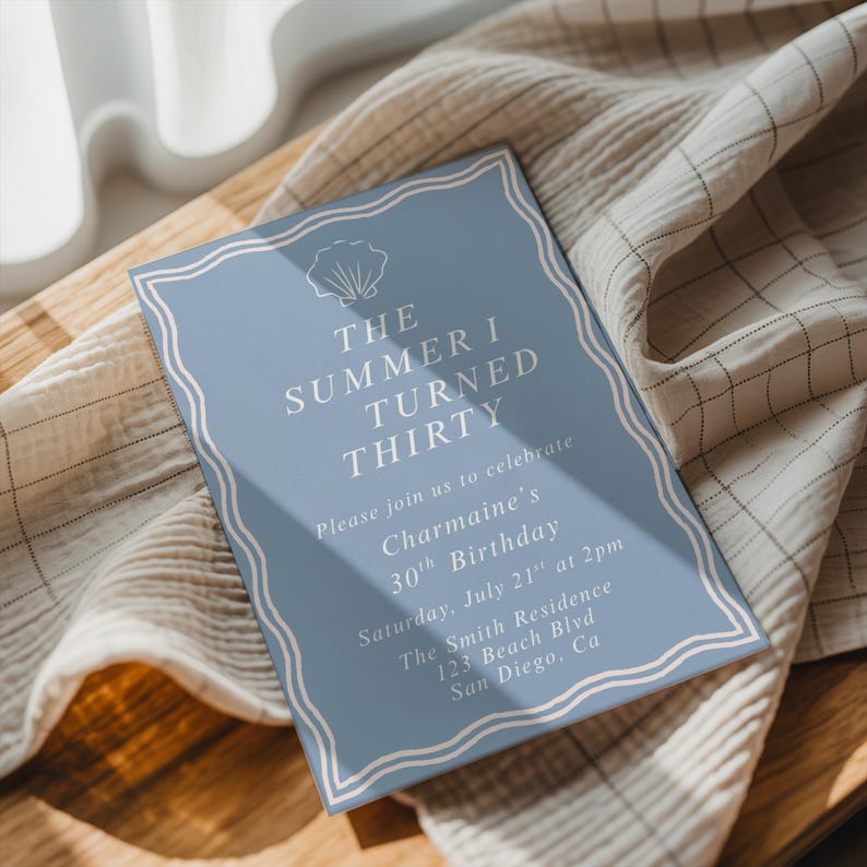 May include: A blue birthday invitation with white text and a seashell graphic. The text reads "The Summer I Turned Thirty" and includes details for a 30th birthday celebration in San Diego, California.